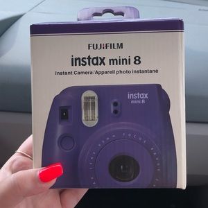Brand new purple Instax mini 8 Fuji film poloroid
